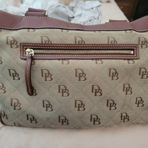 Dooney & Bourke purse in tan and brown with large red compartment